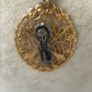 Elegant Gold and Silver Pendant